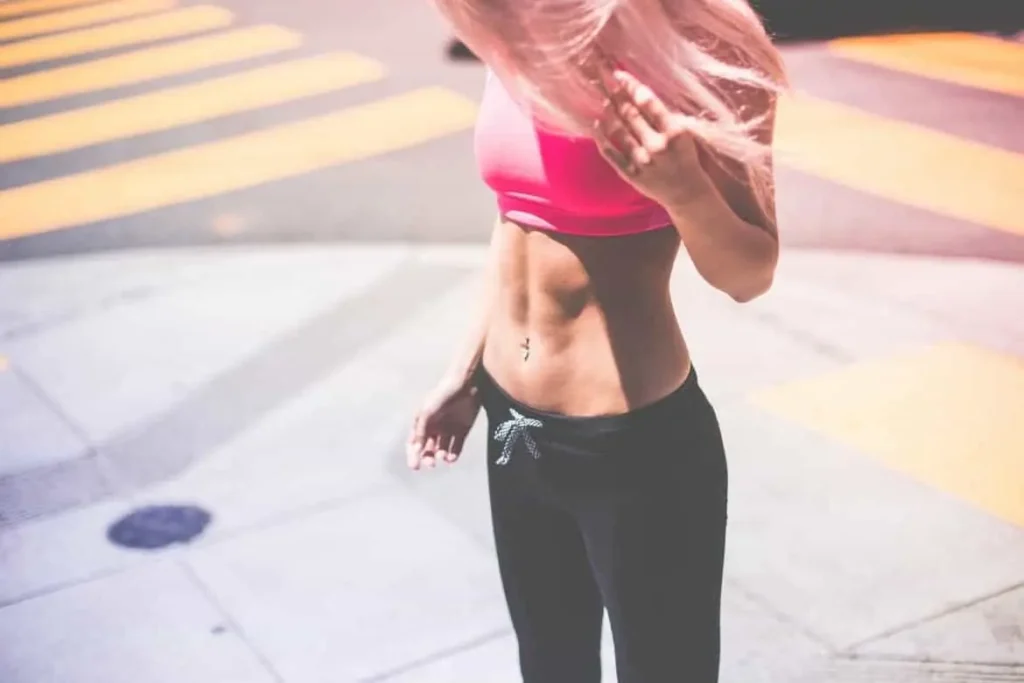 Woman with toned stomach after LA-EMS Body Sculpting Treatment Shepperton