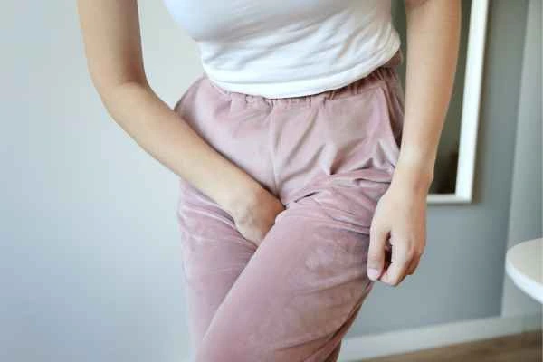 woman running for the toilet because of urinary incontinence Shepperton